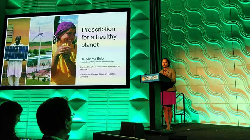 Dr. Aparna Bole, HCWH board member, presenting health care climate commitments at GCAS