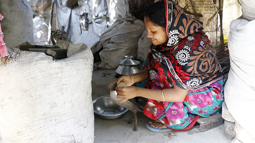 Mitu, a borrower in Bangladesh who used a loan to install a well.