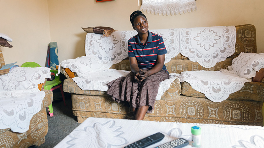 Rose, a woman in Uganda who took out a loan for a household tap