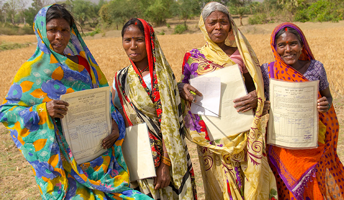 Women in Duari village, Gaya district, Bihar state hold their land titles.