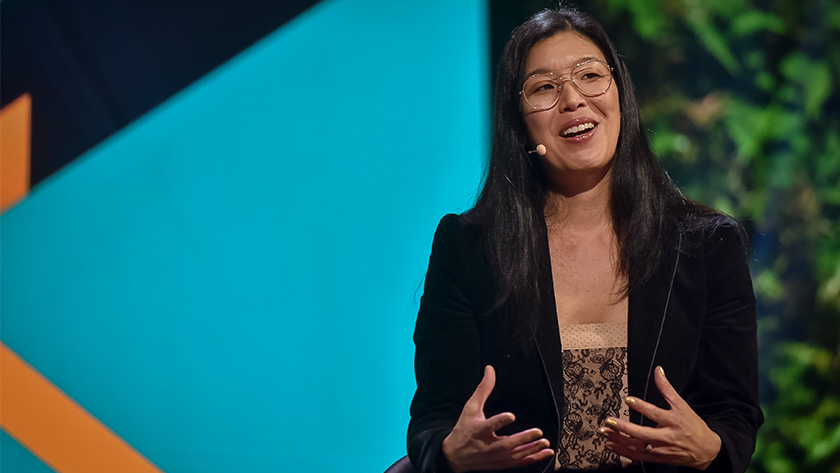 Ai-Jen Poo on stage at the 2019 Skoll World Forum