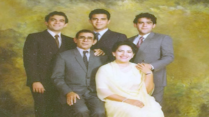 Quratul with her husband and three sons.