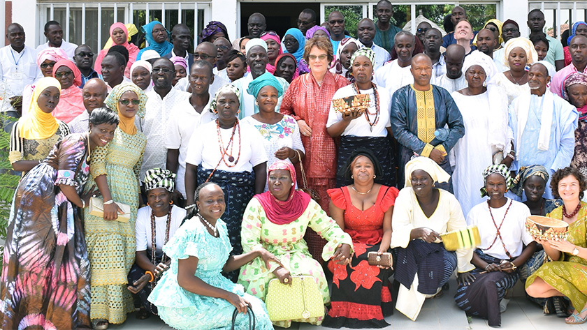 Tostan staff, board members and community participants at the October, 2017 torch-passing event in Senegal, celebrating both Molly and Elena as they transitioned to new roles in the organization.