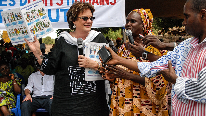 Molly Melching congratulates community members on their awareness-raising event to promote peace and security in the Kolda region of Southern Senegal.