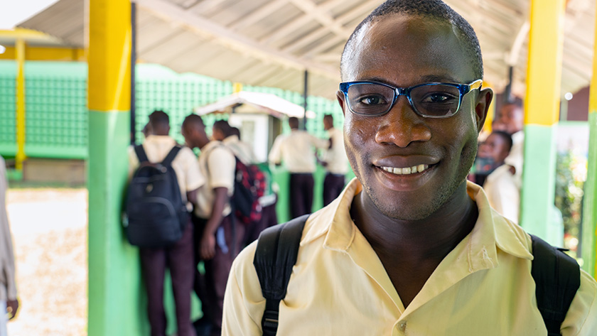 Monrovia, Liberia - G.W. Gibson High School Student, Morris Kanneh, 20, wears glasses provided to him by EYElliance.