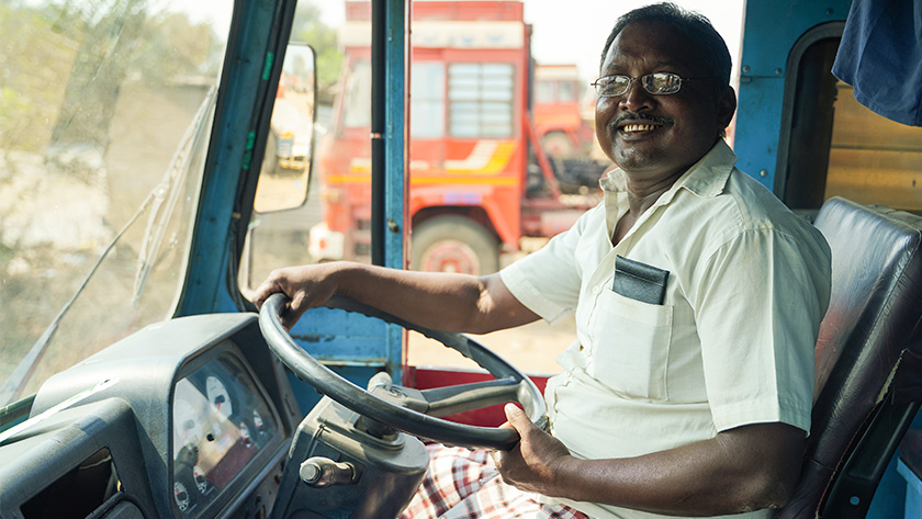 A long-haul truck driver on the outskirts of Mumbai, India, uses VisionSpring eyeglasses to see the road ahead. VisionSpring’s See to be Safe program partners with auto manufacturers, port authorities, and the Ministry of Road Transport and Highways to bring eyeglasses to truckers and transportation workers, reducing the risk of road traffic accidents.